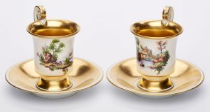 Lot 28/21 Paar Tassen mit UT "Flusslandschaften", Biedermeier-Stil, KPM Berlin 1. Hälfte 20. Jh.