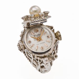 212/877 Gr. Uhren-Ring m. Perle u. Brillanten, 2. Hälfte 20. Jh.