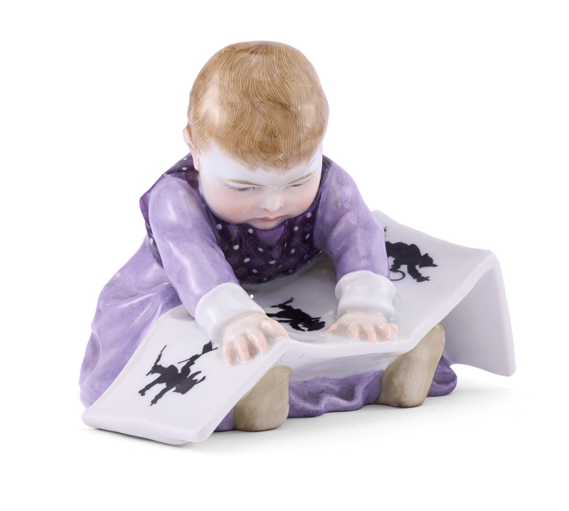 215/483: Hentschelkind Kind mit Struwwelpeter-Buch, Meissen um 1910